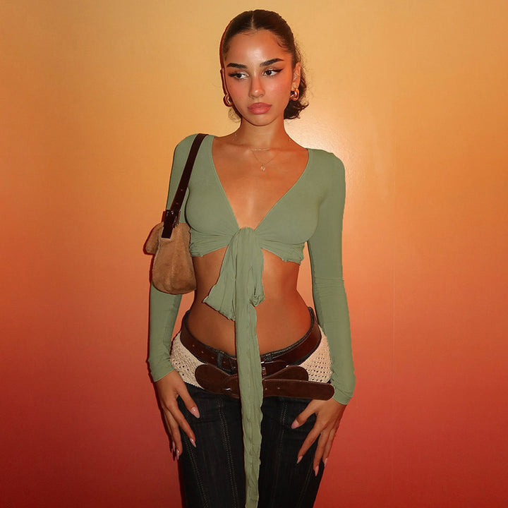 Damer crop top med lekfullt band och långa ärmar Mirla-Eva Jonsson