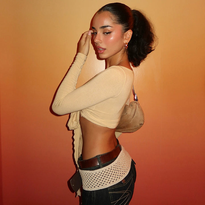 Damer crop top med lekfullt band och långa ärmar Mirla-Eva Jonsson