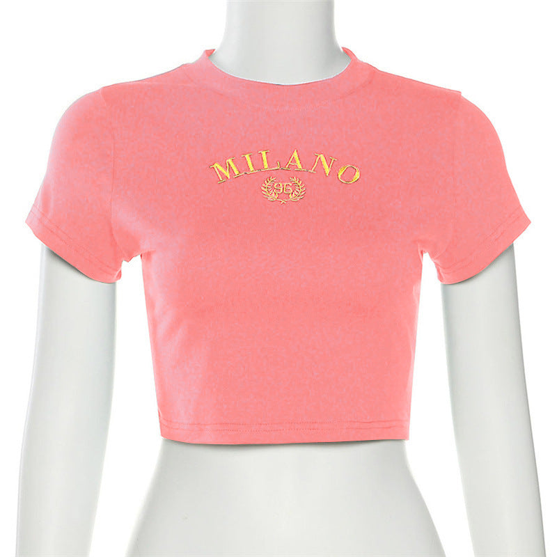 Damer cropped T-shirt med broderad text och rund halsringning Mirla-Eva Jonsson