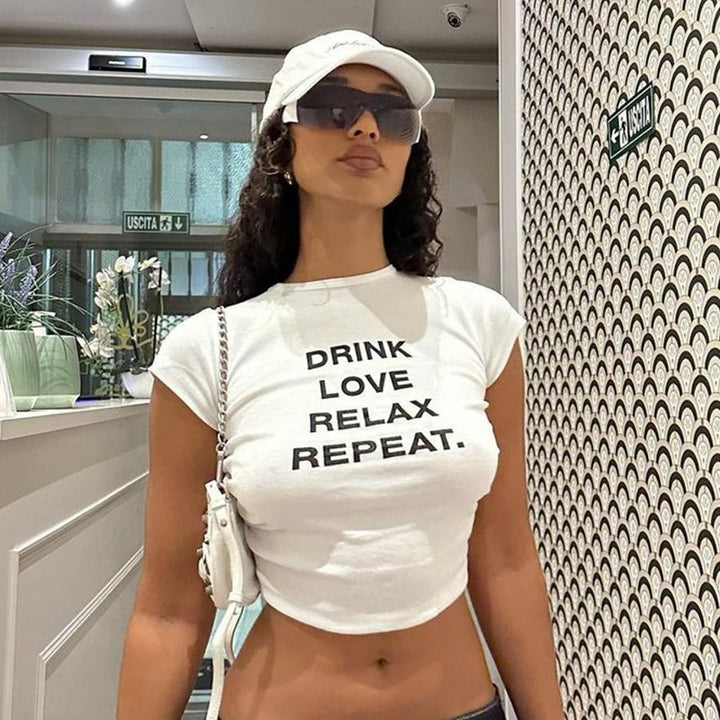 Damer cropped T-shirt med motivtryck Mirla-Eva Jonsson