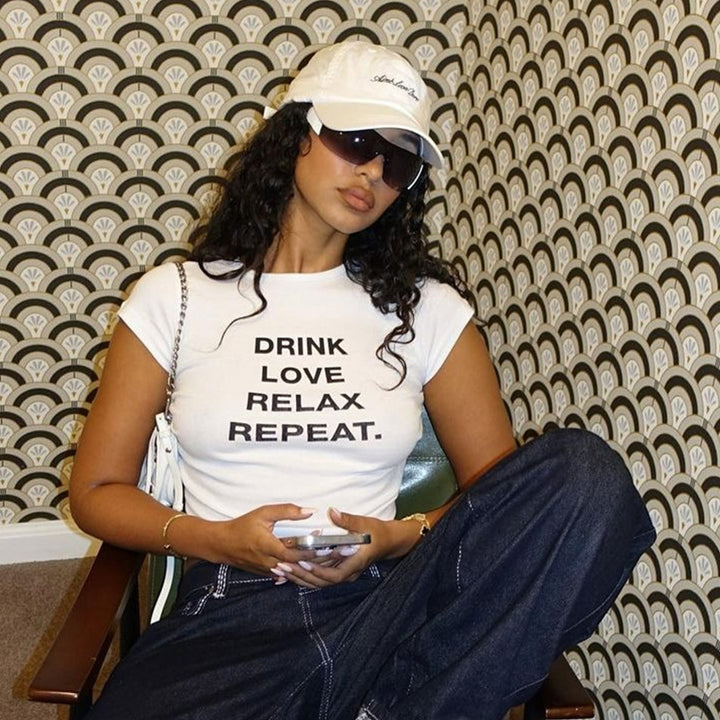 Damer cropped T-shirt med motivtryck Mirla-Eva Jonsson