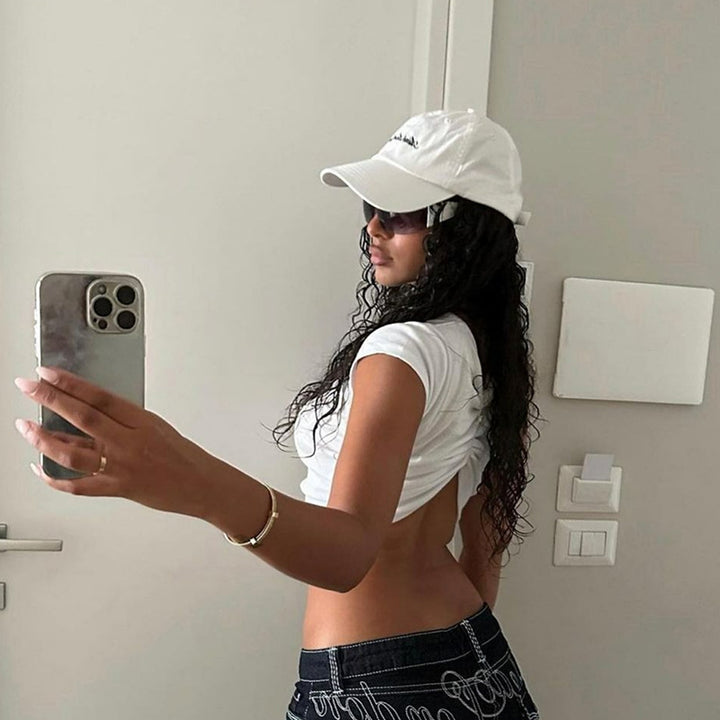 Damer cropped T-shirt med motivtryck Mirla-Eva Jonsson