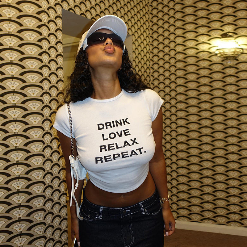 Damer cropped T-shirt med motivtryck Mirla-Eva Jonsson