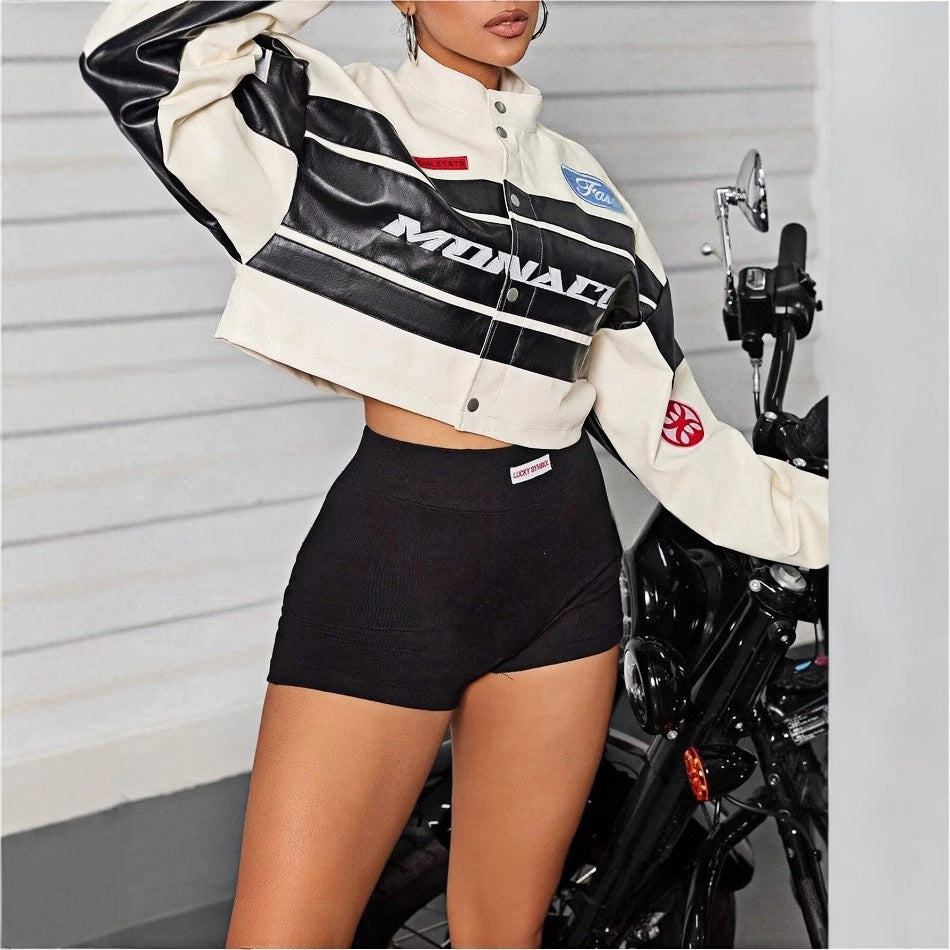 Damer cropped bikerjacka med sportiga branding-elementen Mirla-Eva Jonsson