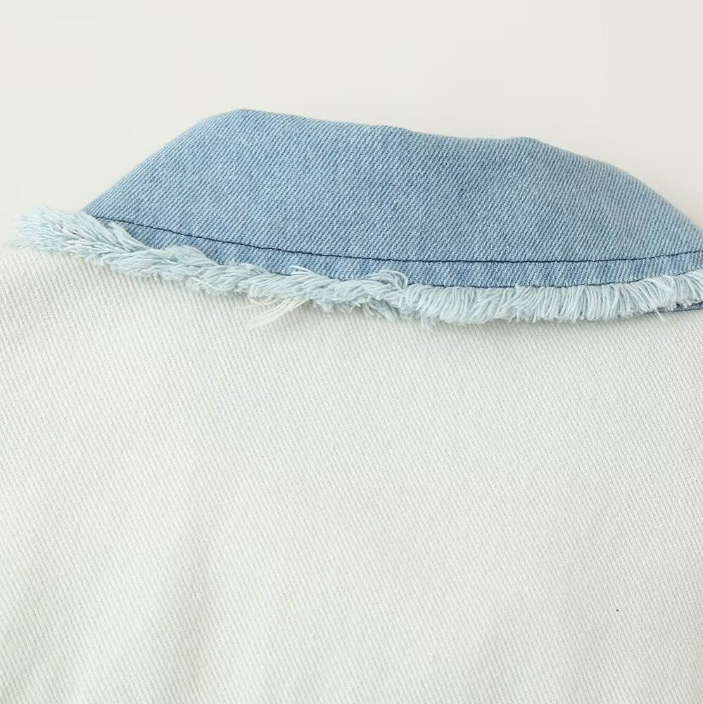 Damer cropped denimjacka med kontrasterande fickor och fransig fåll Mirla-Eva Jonsson