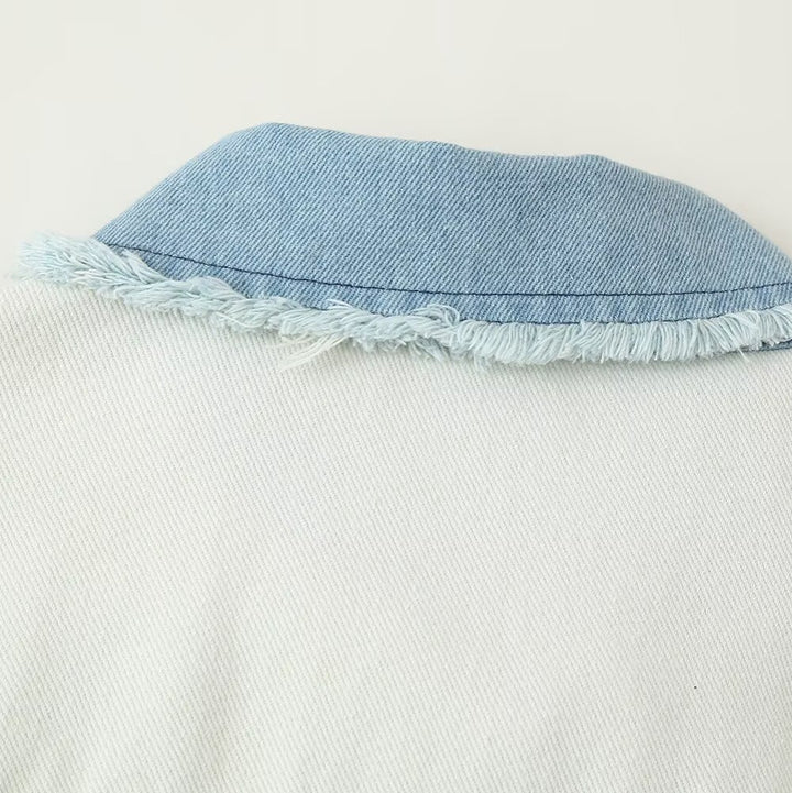 Damer cropped denimjacka med kontrasterande fickor och fransig fåll Mirla-Eva Jonsson