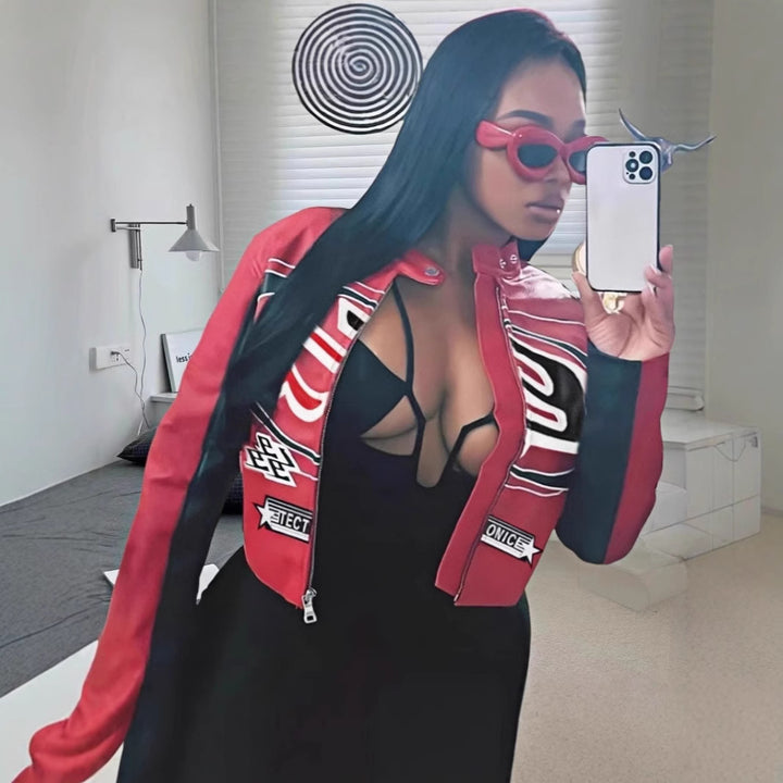 Damer cropped konstläderjacka med kontrasterande färgdetaljer Mirla-Eva Jonsson