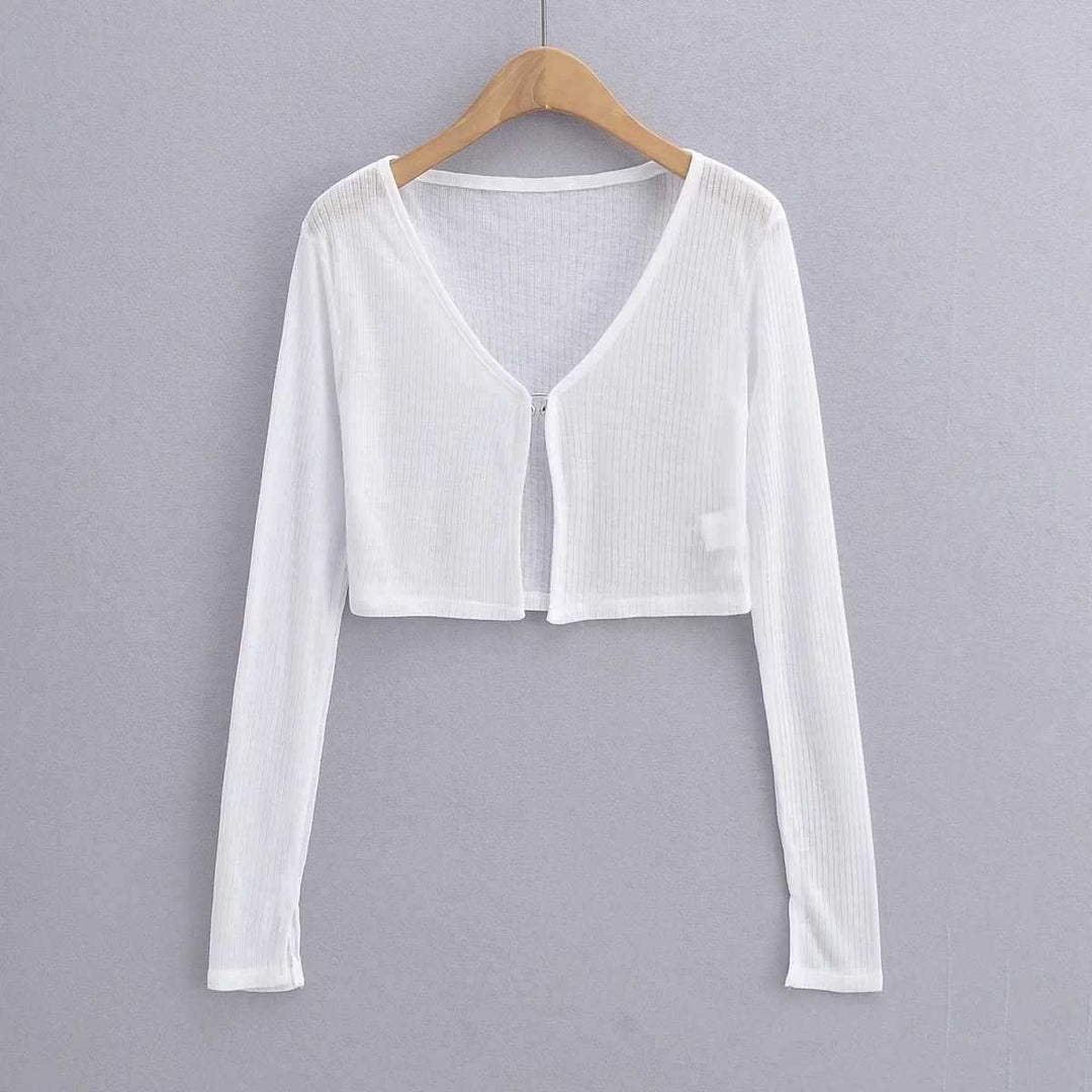 Damer cropped långärmad t-shirt med fin ribbad struktur Mirla-Eva Jonsson