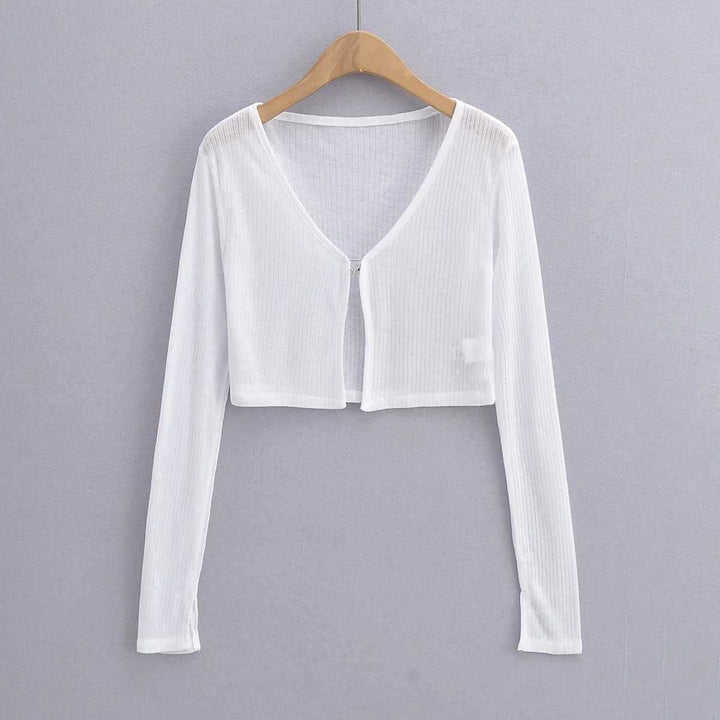 Damer cropped långärmad t-shirt med fin ribbad struktur Mirla-Eva Jonsson