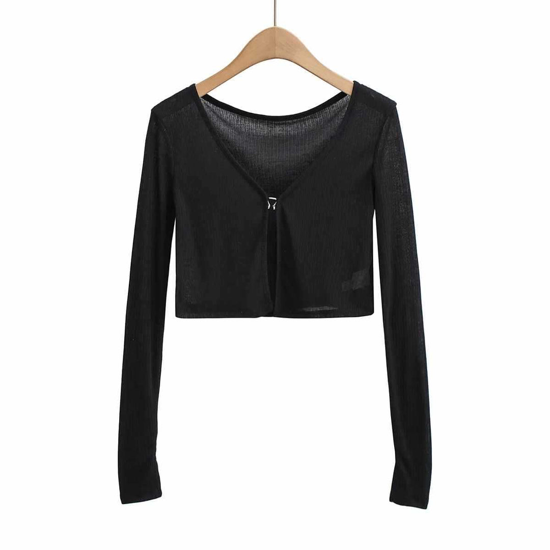 Damer cropped långärmad t-shirt med fin ribbad struktur Mirla-Eva Jonsson