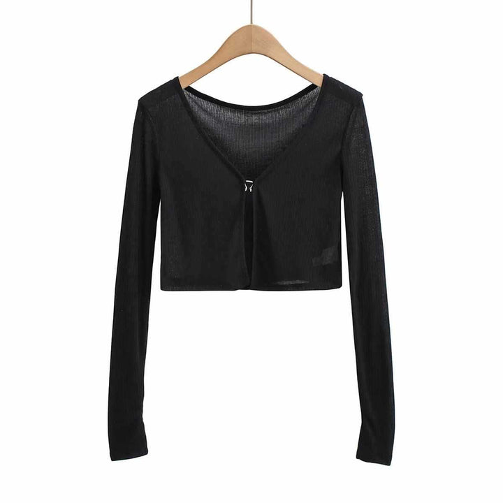 Damer cropped långärmad t-shirt med fin ribbad struktur Mirla-Eva Jonsson