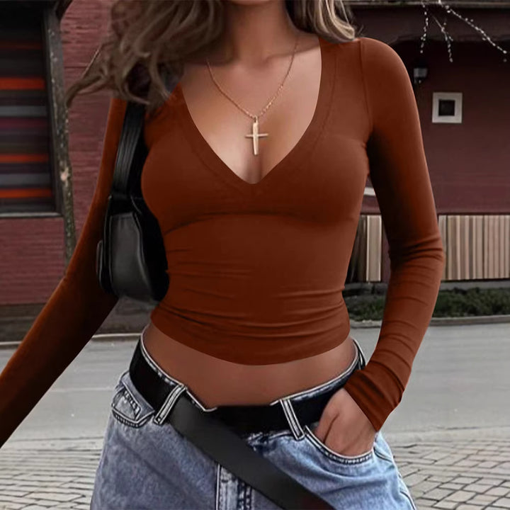 Damer cropped långärmad tröja med V-ringning och elastiskt material Mirla-Eva Jonsson