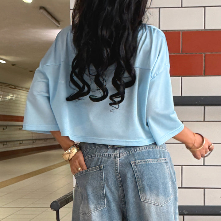 Damer cropped sporttopp i avslappnad mesh-design Mirla-Eva Jonsson