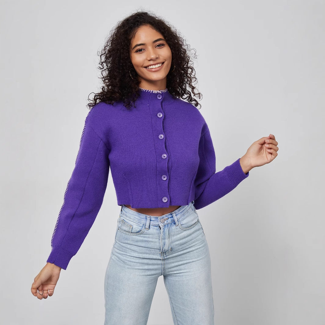 Damer cropped stickad jacka med dekorativa knappar Mirla-Eva Jonsson