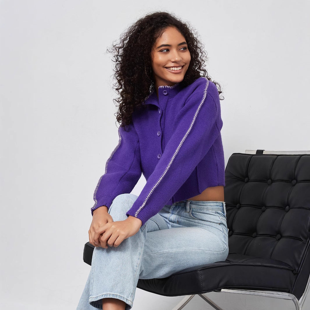 Damer cropped stickad jacka med dekorativa knappar Mirla-Eva Jonsson