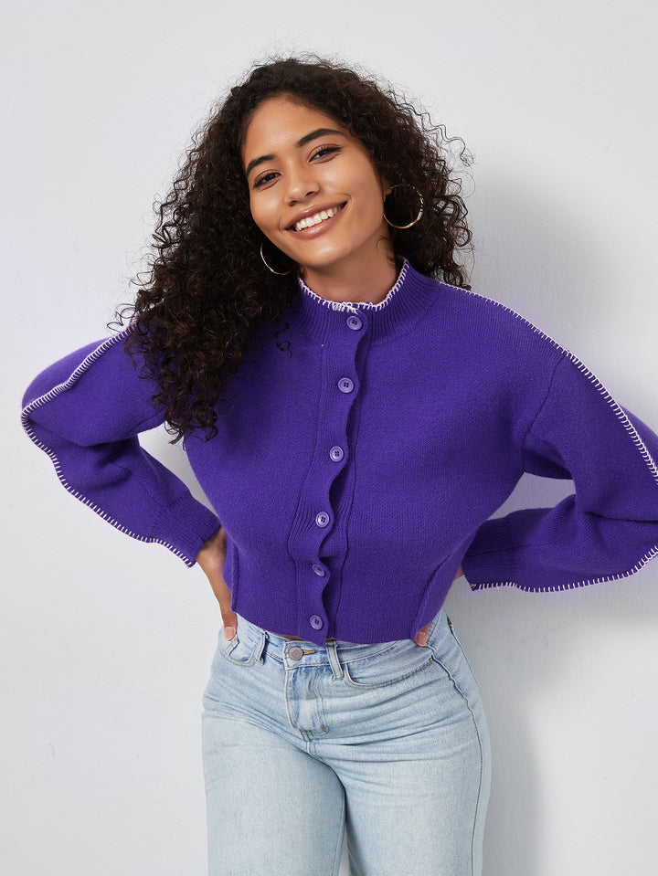 Damer cropped stickad jacka med dekorativa knappar Mirla-Eva Jonsson