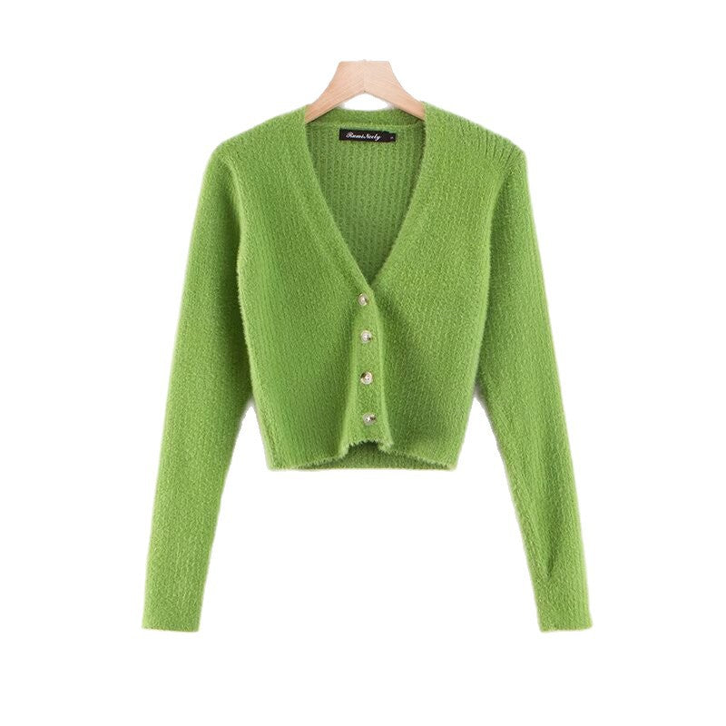 Damer cropped stickad jacka med dekorativa knapppdetaljer Mirla-Eva Jonsson