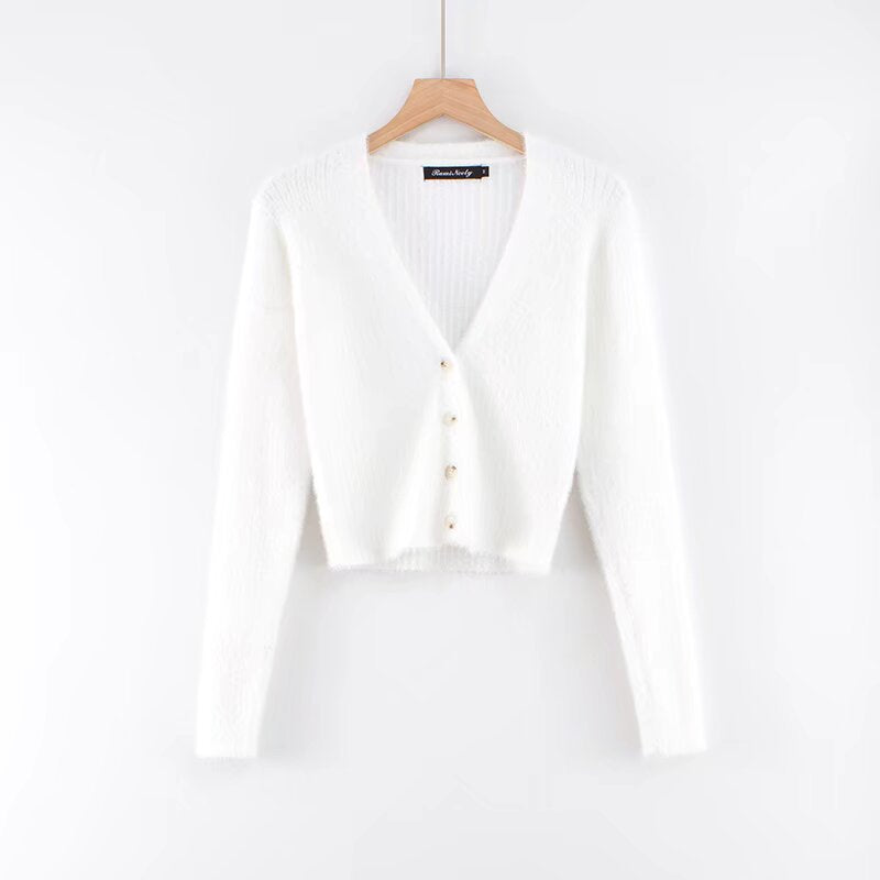 Damer cropped stickad jacka med dekorativa knapppdetaljer Mirla-Eva Jonsson