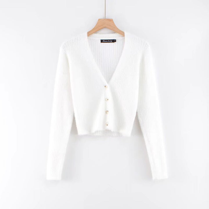 Damer cropped stickad jacka med dekorativa knapppdetaljer Mirla-Eva Jonsson