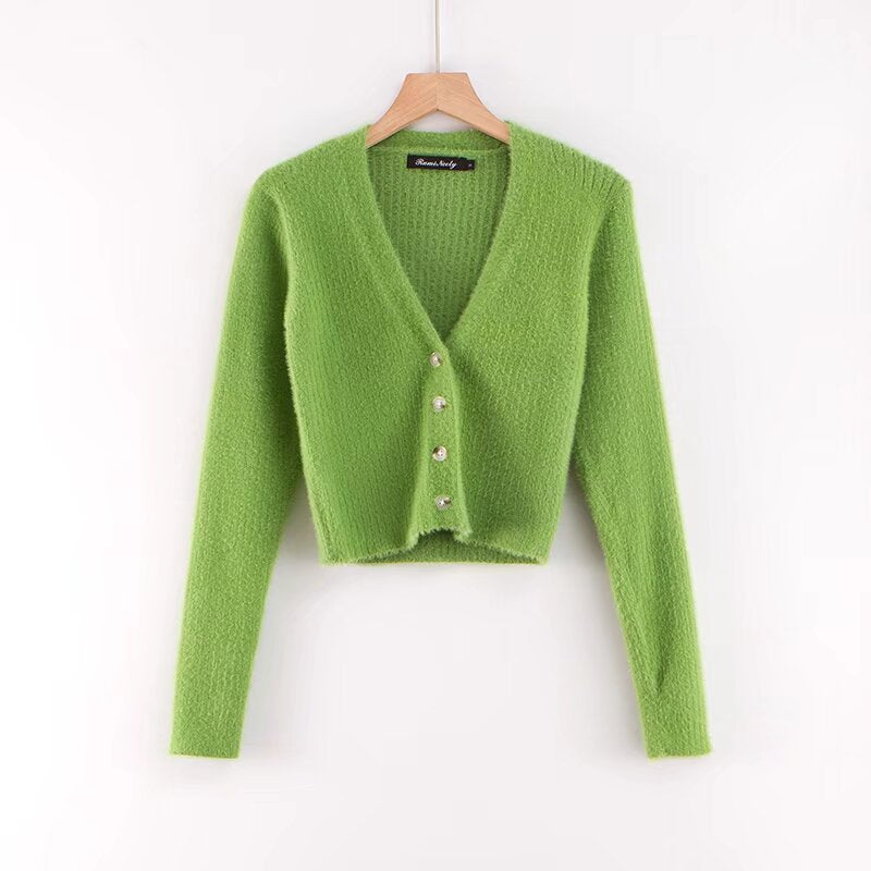 Damer cropped stickad jacka med dekorativa knapppdetaljer Mirla-Eva Jonsson