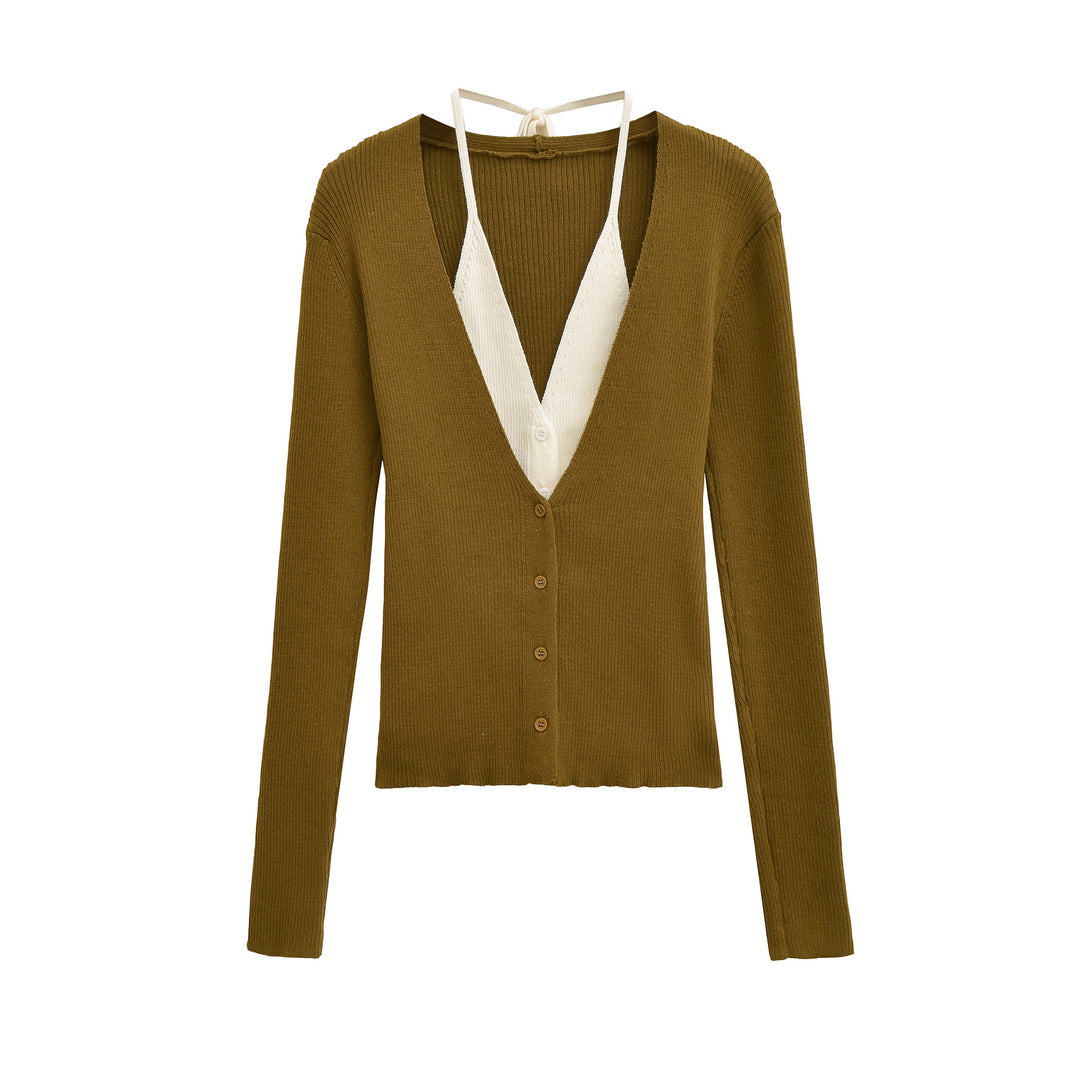 Damer cropped stickad jacka med djup V-ringning och knappdetaljer Mirla-Eva Jonsson