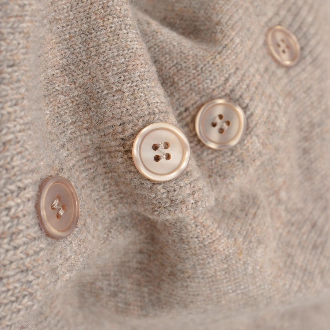 Damer cropped stickad jacka med knäppning Mirla-Eva Jonsson