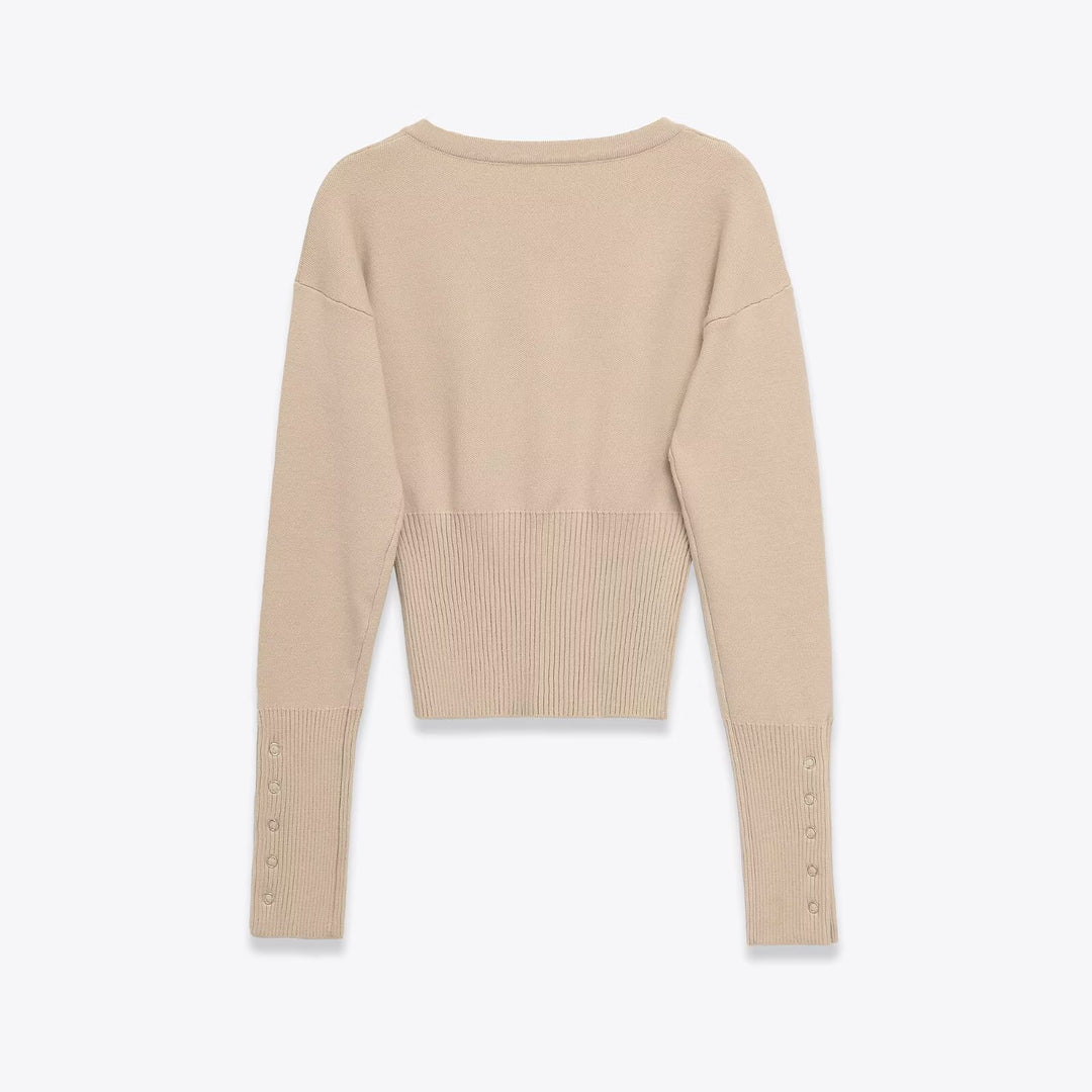 Damer cropped stickad tröja med knapprad och långa ärmar Mirla-Eva Jonsson