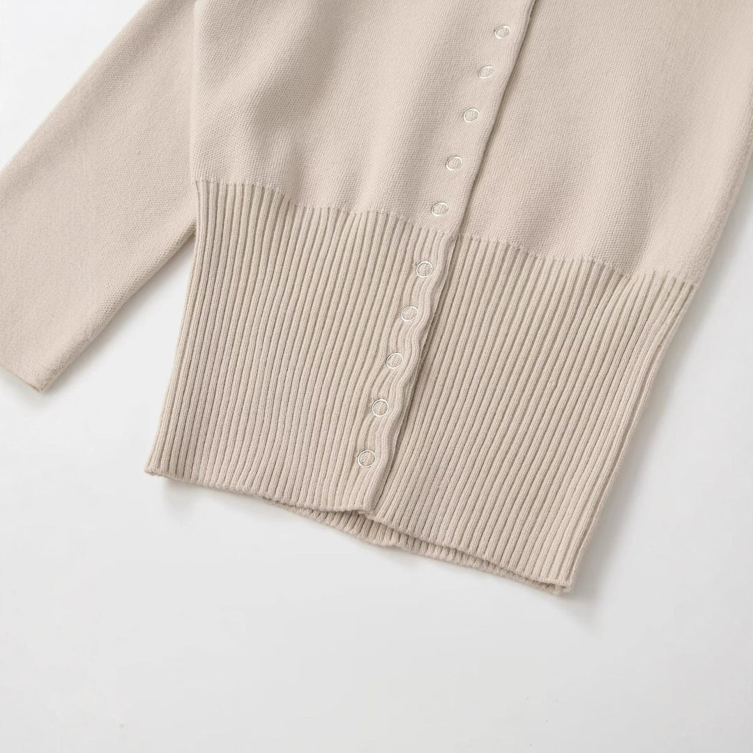Damer cropped stickad tröja med knapprad och långa ärmar Mirla-Eva Jonsson