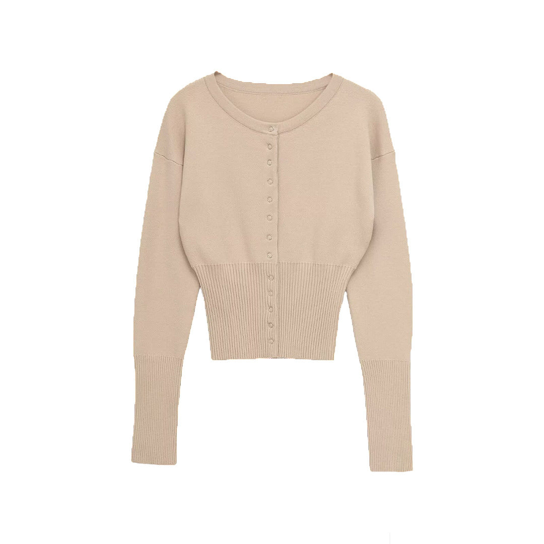 Damer cropped stickad tröja med knapprad och långa ärmar Mirla-Eva Jonsson