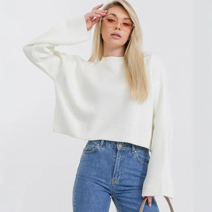 Damer cropped stickad tröja med voluminösa ärmar och rundhalsringning Mirla-Eva Jonsson