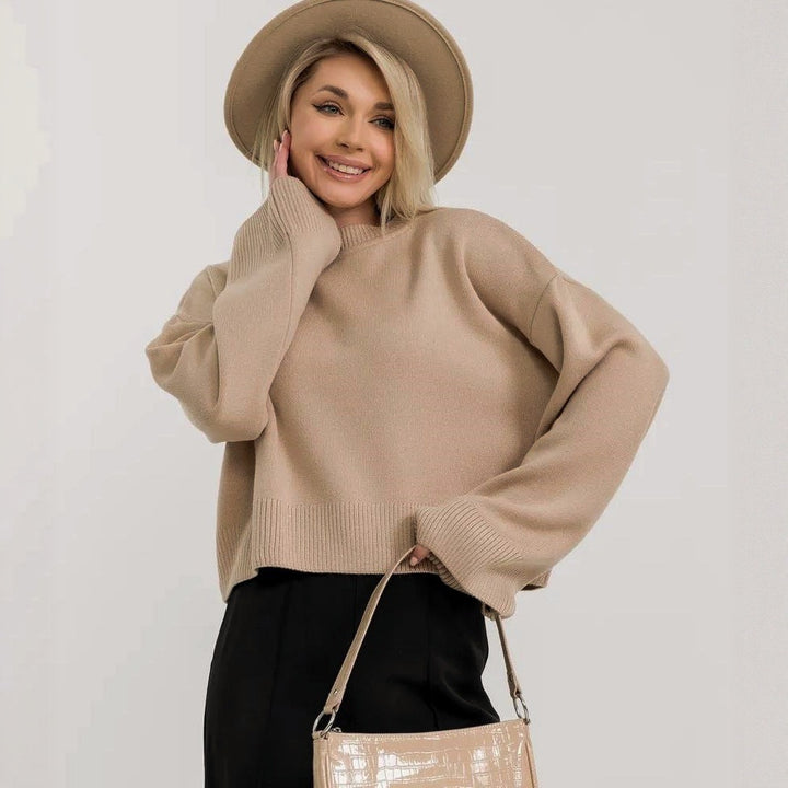 Damer cropped stickad tröja med voluminösa ärmar och rundhalsringning Mirla-Eva Jonsson