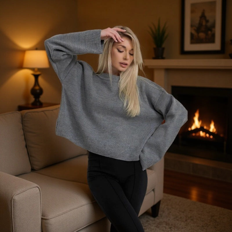 Damer cropped stickad tröja med voluminösa ärmar och rundhalsringning Mirla-Eva Jonsson