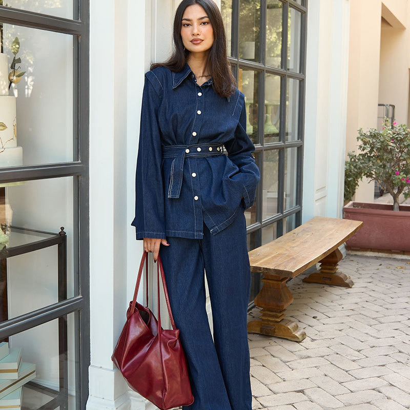 Damer denim jumpsuit med elegant bälte och vida ben Mirla-Eva Jonsson
