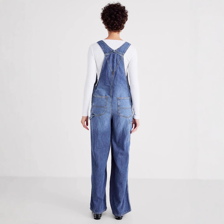 Damer denim jumpsuit med vida ben och justerbara axelband Mirla-Eva Jonsson
