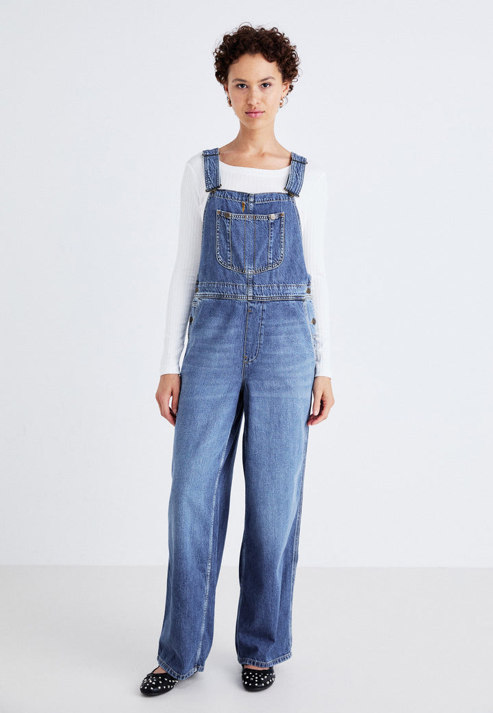 Damer denim jumpsuit med vida ben och justerbara axelband Mirla-Eva Jonsson