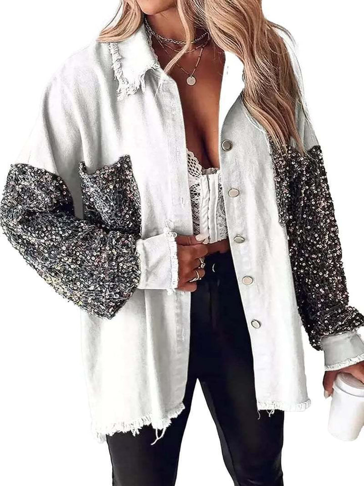 Damer denimblus med glittrande ärmar och fransig nederkant Mirla-Eva Jonsson