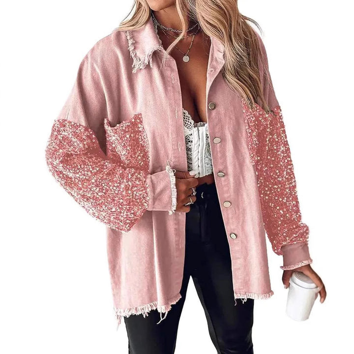 Damer denimblus med glittrande ärmar och fransig nederkant Mirla-Eva Jonsson