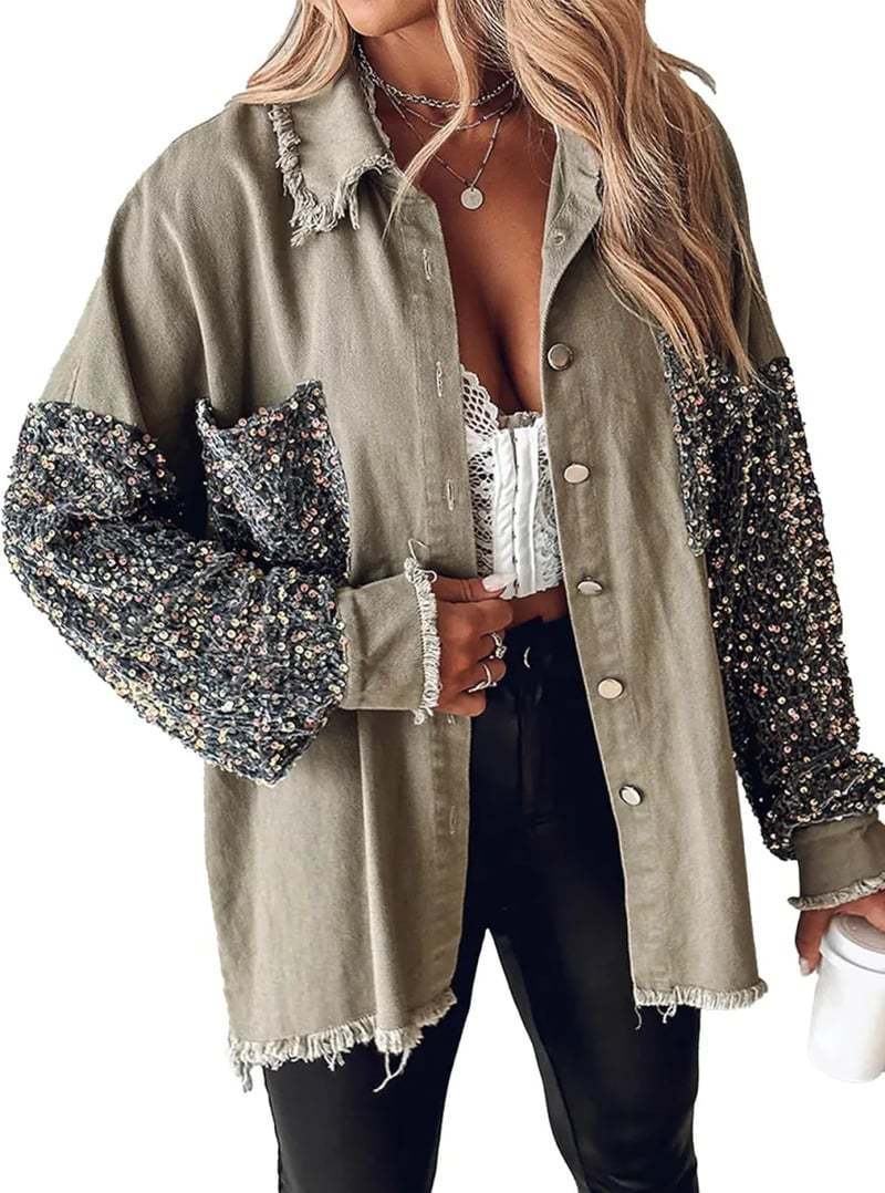 Damer denimblus med glittrande ärmar och fransig nederkant Mirla-Eva Jonsson