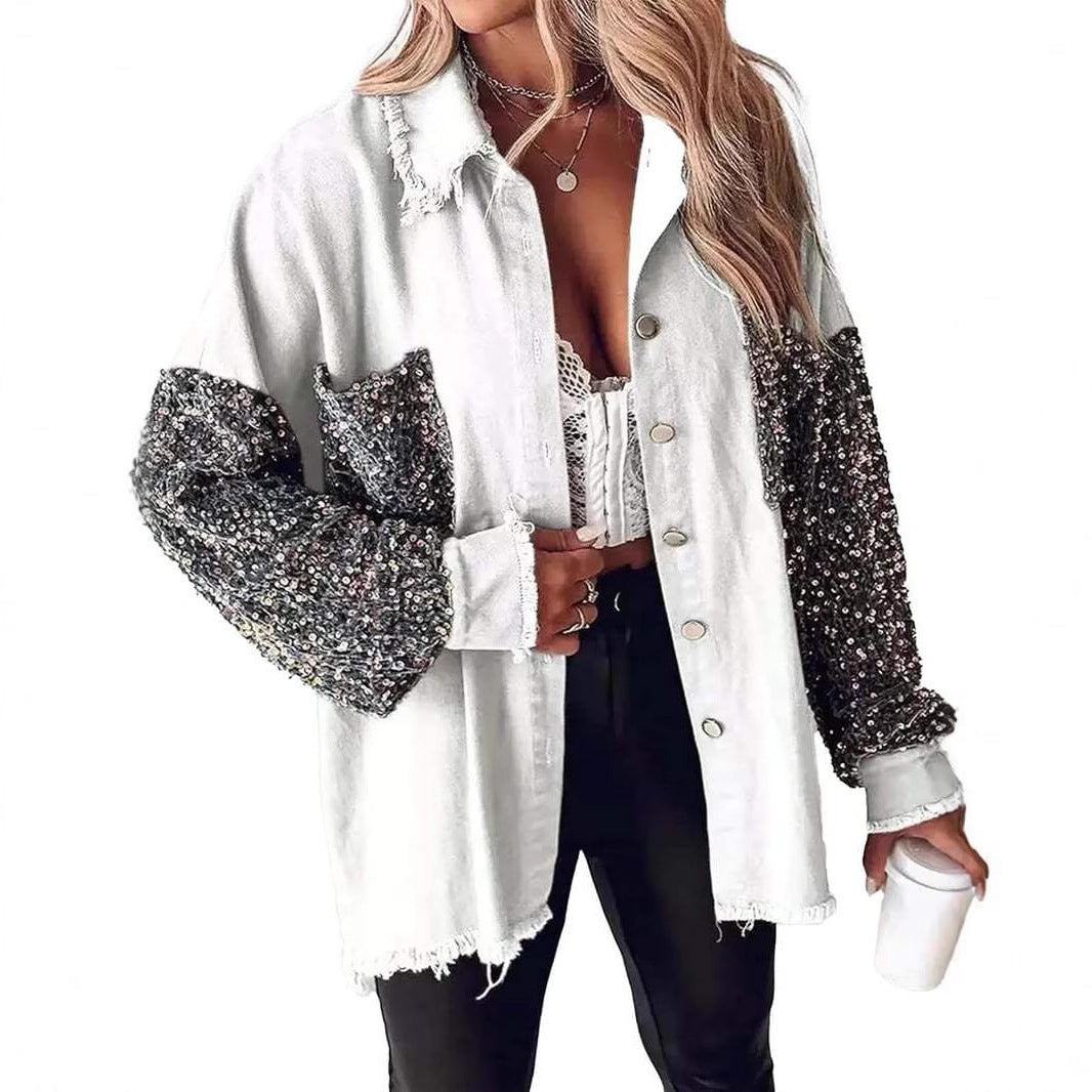 Damer denimblus med glittrande ärmar och fransig nederkant Mirla-Eva Jonsson