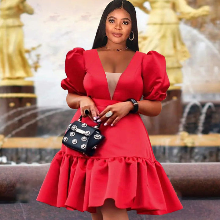 Damer elegant Fit-and-Flare klänning med puffärmar Mirla-Eva Jonsson