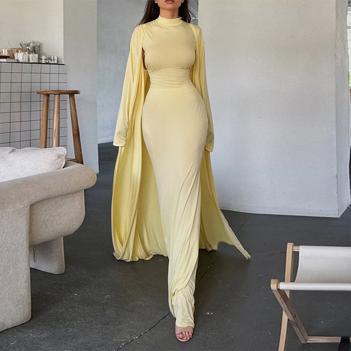 Damer elegant Maxi klänning med vid cape och långa ärmar Mirla-Eva Jonsson