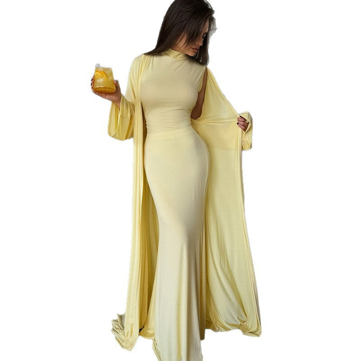 Damer elegant Maxi klänning med vid cape och långa ärmar Mirla-Eva Jonsson