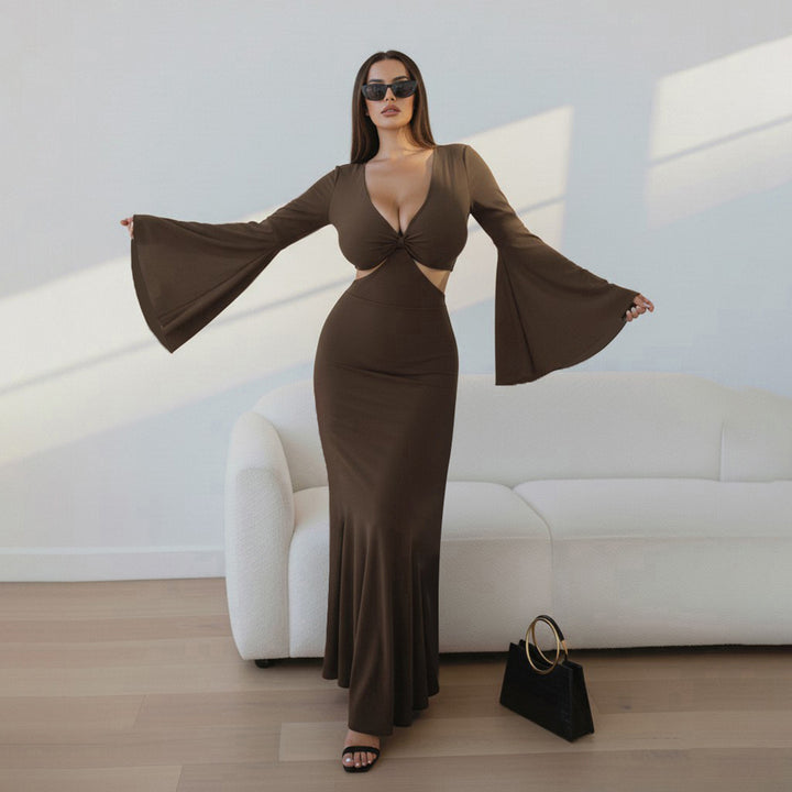 Damer elegant Maxiklänning med generösa trumpetärmar och raffinerad cut-out Mirla-Eva Jonsson