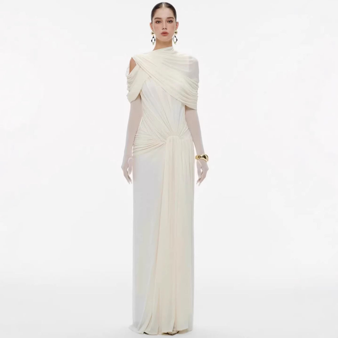 Damer elegant Maxiklänning med innovativa draperingsdetaljer och asymmetrisk överdel Mirla-Eva Jonsson