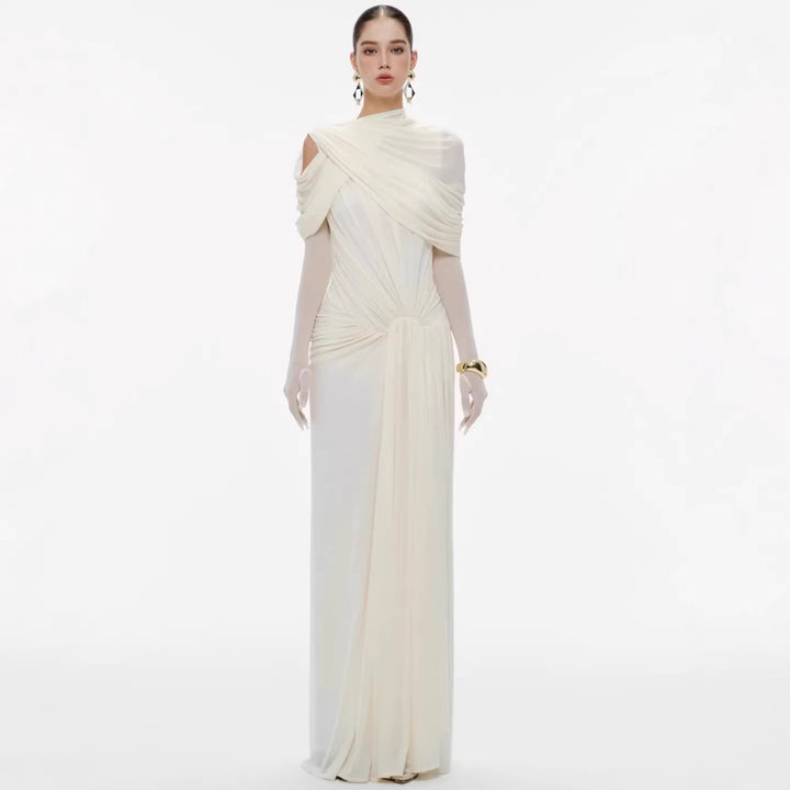 Damer elegant Maxiklänning med innovativa draperingsdetaljer och asymmetrisk överdel Mirla-Eva Jonsson