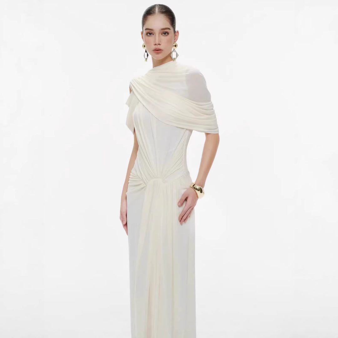 Damer elegant Maxiklänning med innovativa draperingsdetaljer och asymmetrisk överdel Mirla-Eva Jonsson