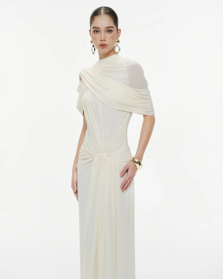 Damer elegant Maxiklänning med innovativa draperingsdetaljer och asymmetrisk överdel Mirla-Eva Jonsson