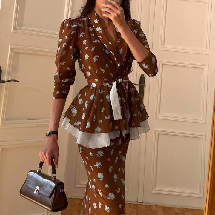 Damer elegant Maxiklänning med voluminös volangslut och blommönster Mirla-Eva Jonsson