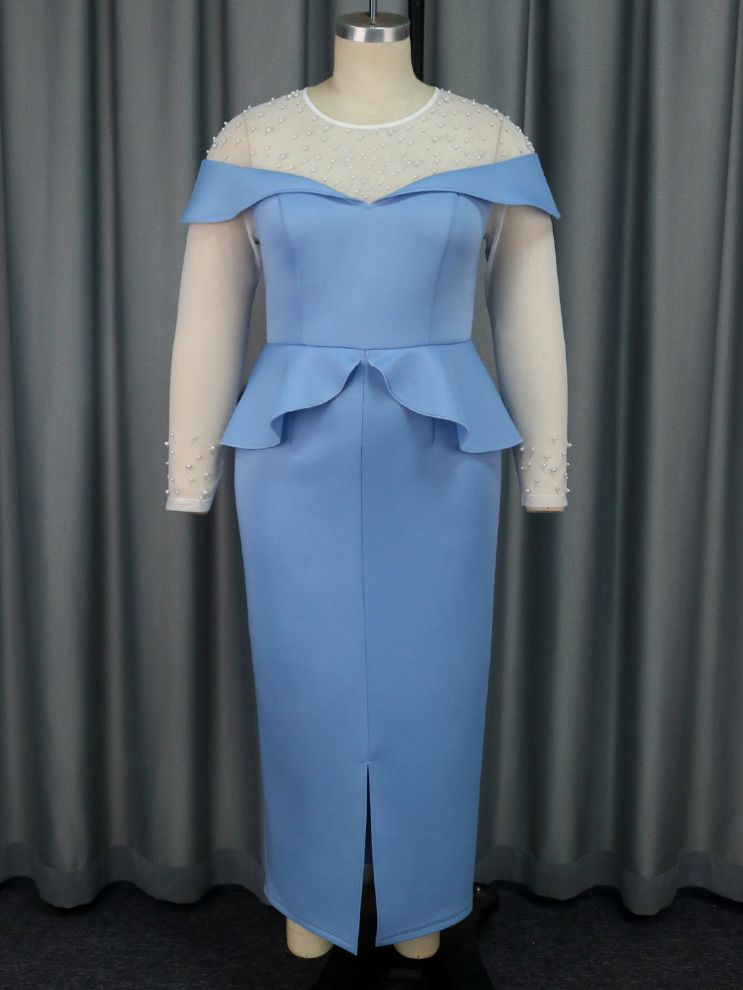 Damer elegant Midi-klänning med off-shoulder design och volangelement Mirla-Eva Jonsson