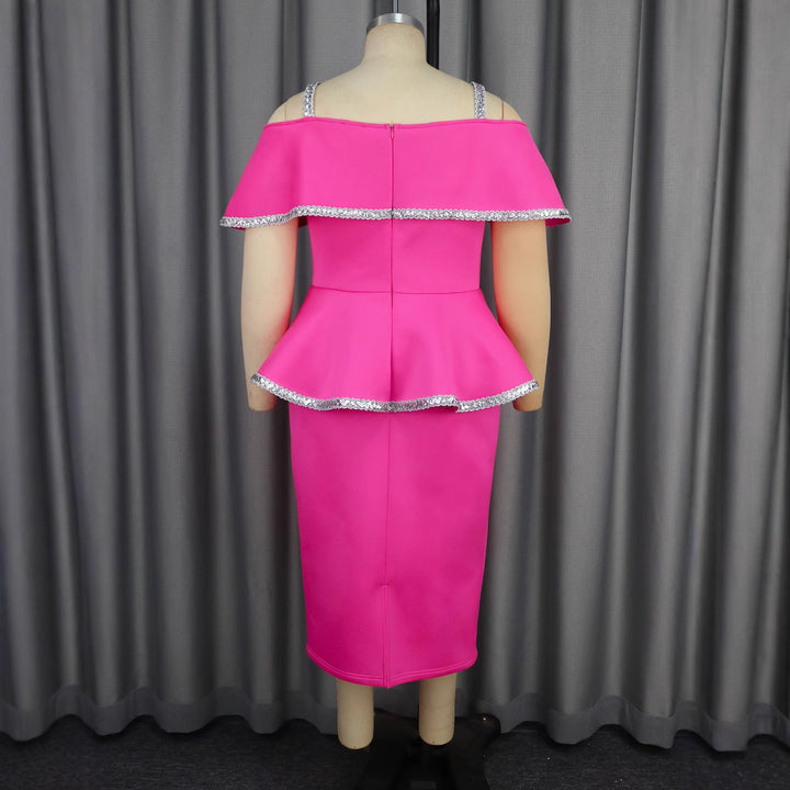 Damer elegant Peplum-klänning med off-shoulder design och glittrande detaljer Mirla-Eva Jonsson